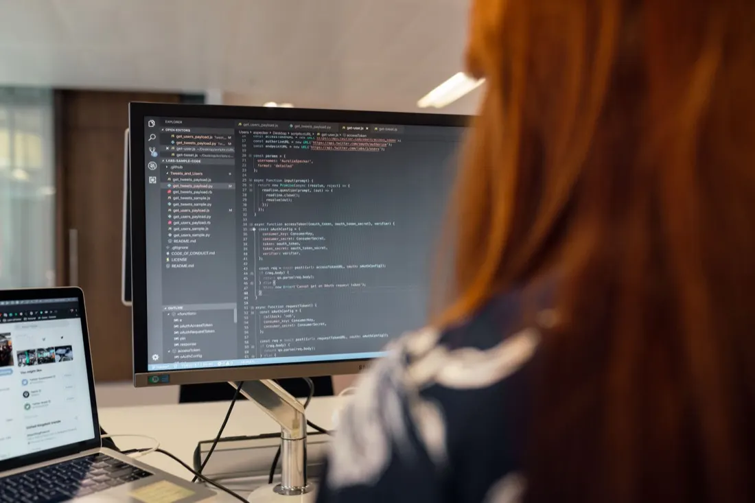 Engineer writing code for a custom web application in Indianapolis