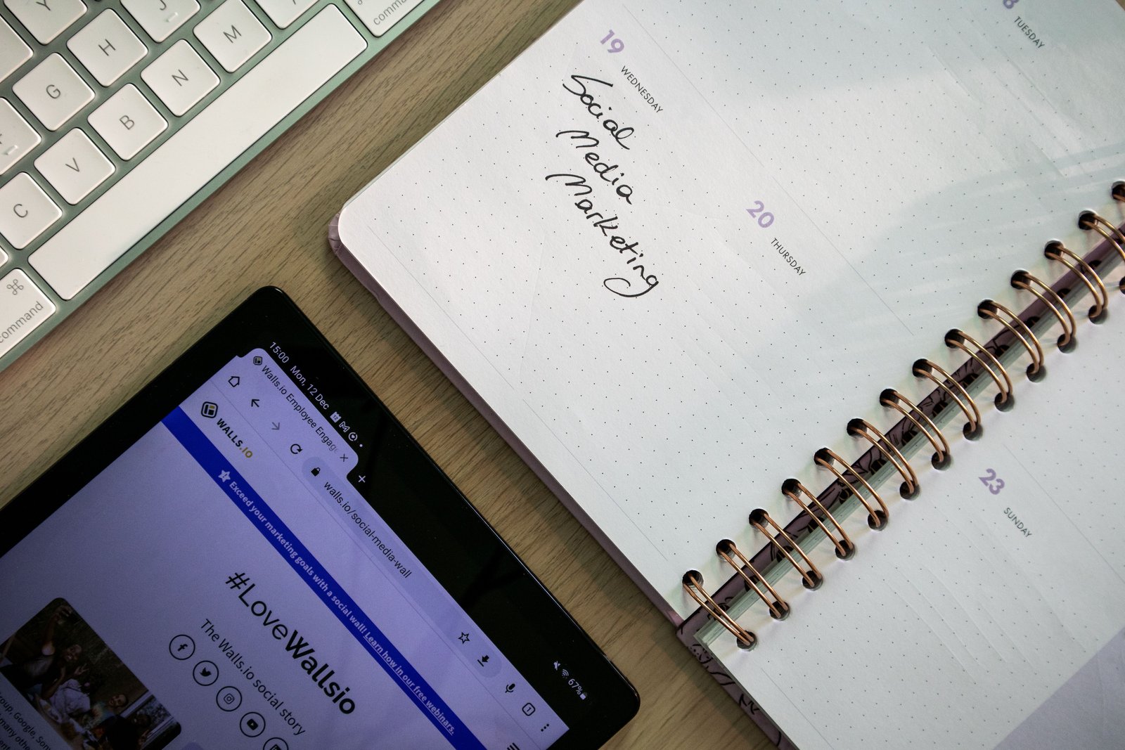 Tablet and notebook used for social and content planning