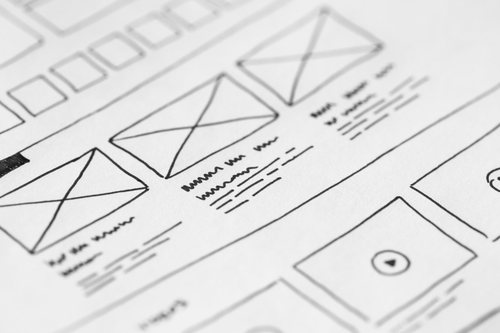 Hand-drawn wireframe sketches for UX conversion work