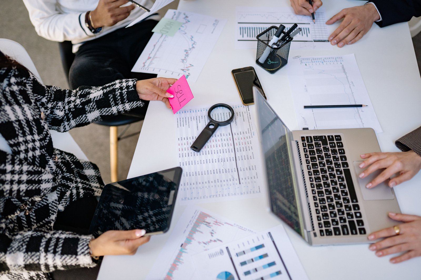 Business professionals collaborating on SEO and growth analysis